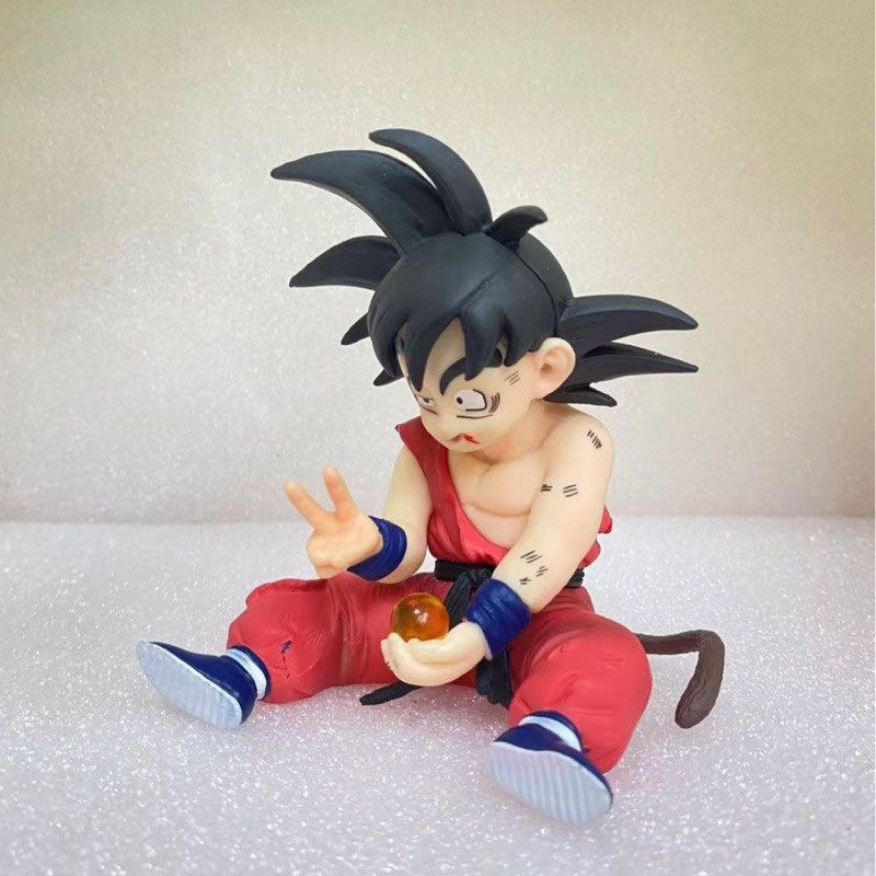 Dragon Ball Super Saiyan Sitting Posture Injured and Battle-Damaged Goku Desktop Case Decoration Toy Birthday Gift